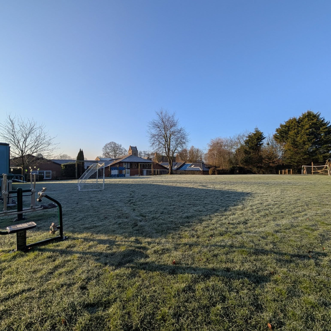 Blue skies and a frosty field at Rothersthorpe's large outdoor space in March